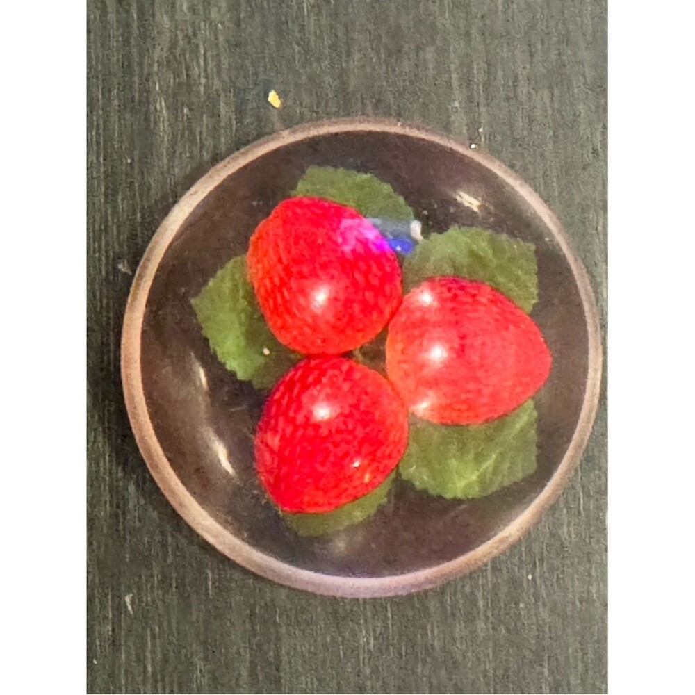 Vintage Lucite paperweight, red strawberries and green leaves